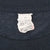 Close-up of worn neck tag inside black Rolling Stones T-shirt
