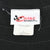 Close-up of Chase Authentics neck label on black T-shirt