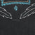 Close-up of feather details and ©1998 H-D text beneath the Harley-Davidson front graphic