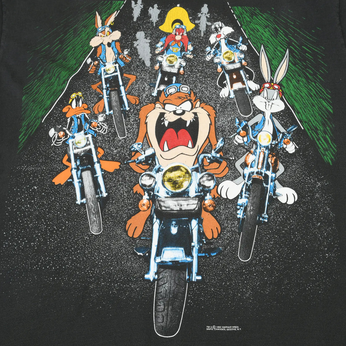 Front graphic detail with Taz, Bugs Bunny, Daffy Duck and other Looney Tunes characters on motorcycles