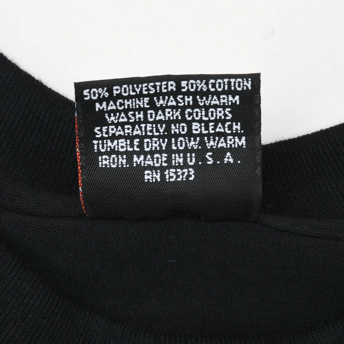 Care label listing 50% polyester, 50% cotton and Made in USA