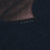 Close-up of faint copyright marking printed on black fabric