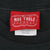 Red Mac Tools Apparel neck label with Adult Large size tag on black T-shirt