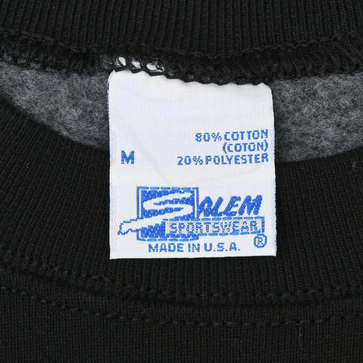 Salem Sportswear neck label showing medium, cotton-polyester blend, and Made in USA