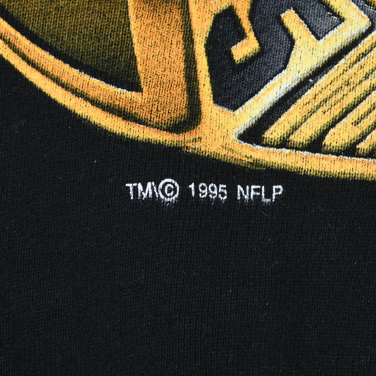 Close-up of TM © 1995 NFLP mark beneath the sweatshirt graphic