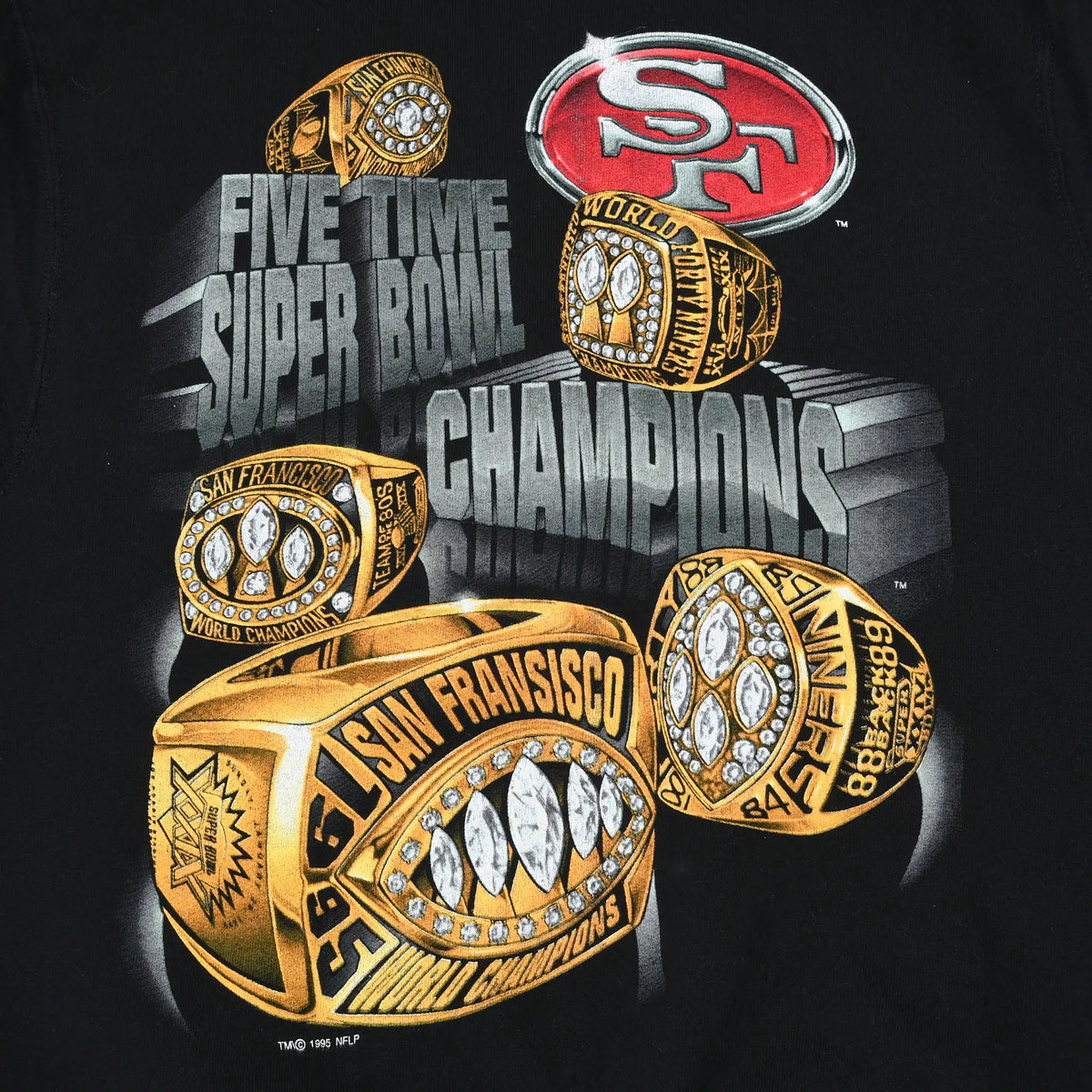 Close-up of 49ers five-time Super Bowl champions graphic with logo and five gold rings