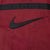 Large black Nike Swoosh detail on burgundy back panel