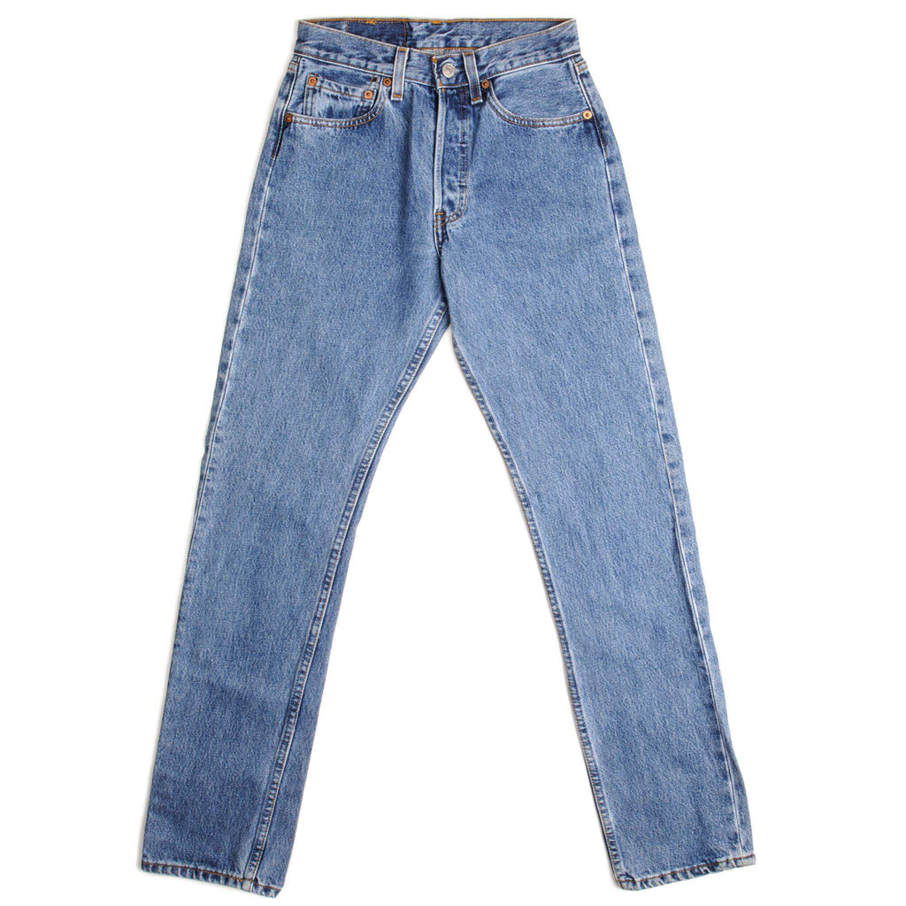 Beautiful Indigo Levis 501 Jeans 1990s Made in USA with a light blue wash.  Size 25x31  Back Button #357