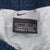 VINTAGE NIKE WHITE AND BLUE NYLON TRACK PANTS 2000S SIZE LARGE