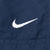 VINTAGE NIKE WHITE AND BLUE NYLON TRACK PANTS 2000S SIZE LARGE