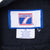 Logo 7 neck label and medium-size care tag inside Pittsburgh Steelers sweatshirt