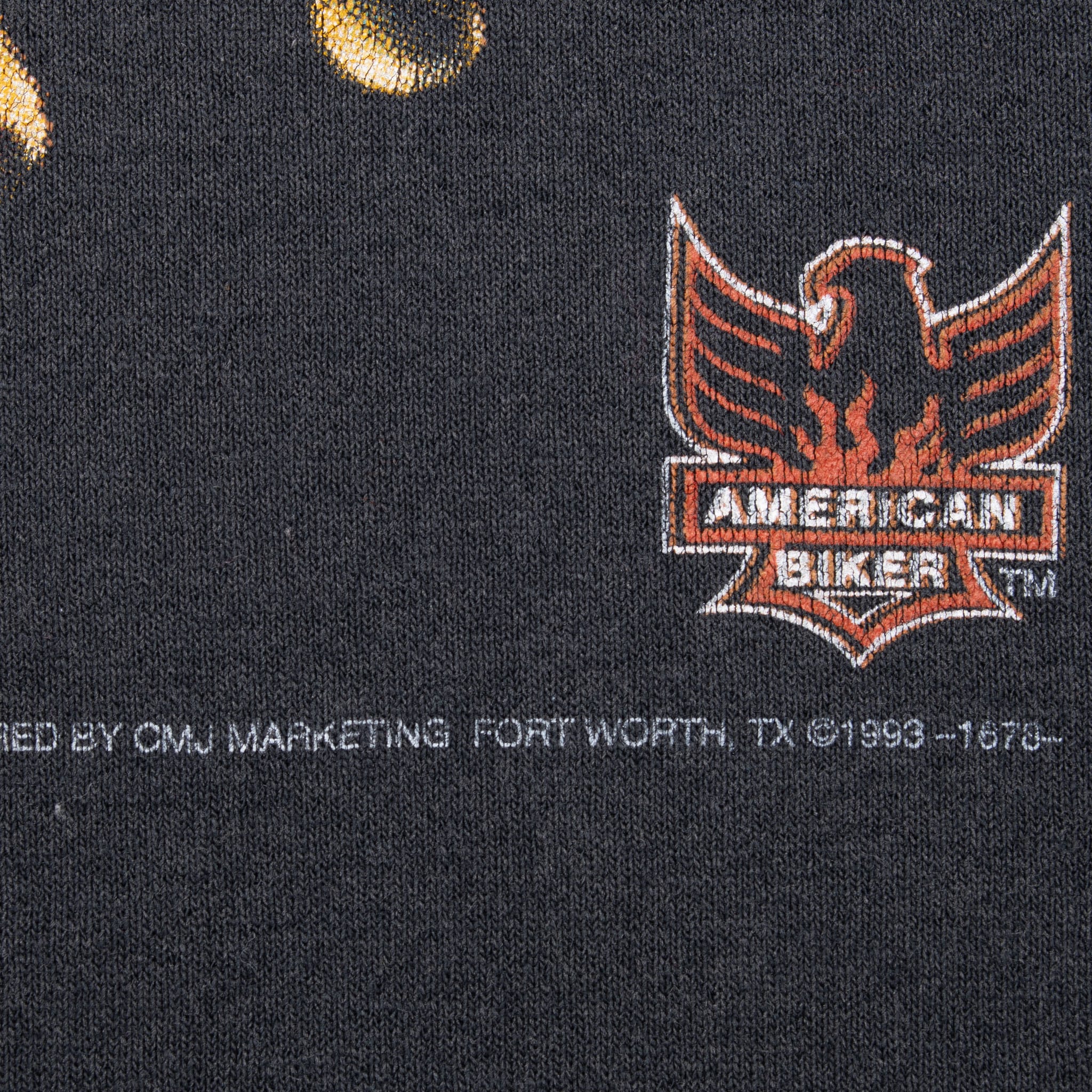 American Biker eagle logo and 1993 copyright print detail
