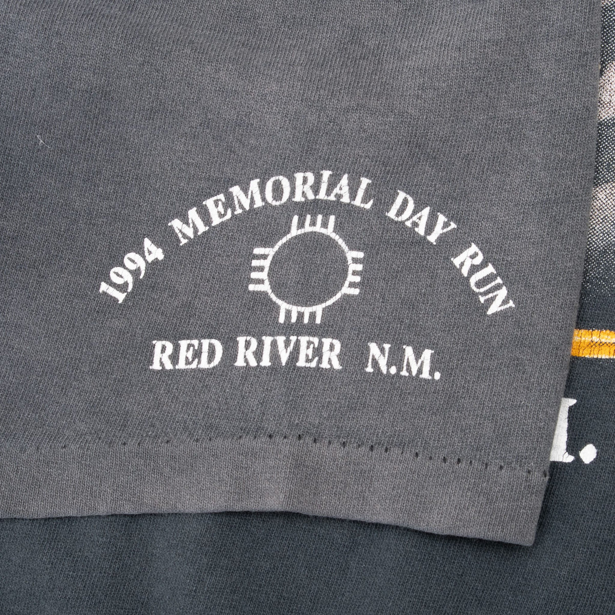 Sleeve print reading 1994 Memorial Day Run, Red River N.M., with sun symbol