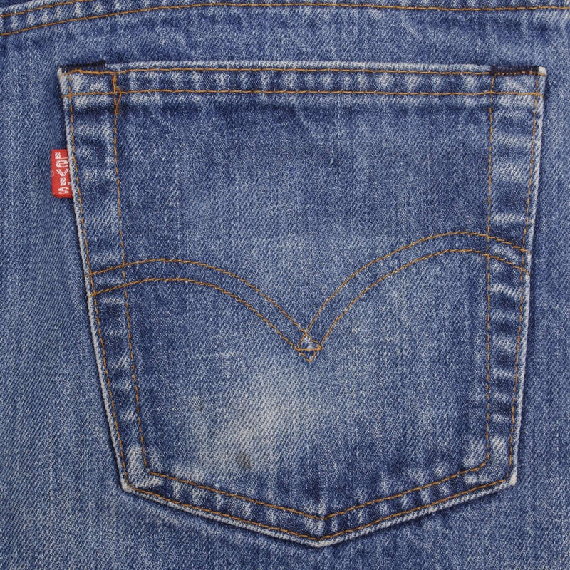 Beautiful Indigo Levis 517 Jeans With Blue Bar Tacks 1980s Made in USA with Medium Dark Wash With Light Whiskers.   Size on tag 36X32 Actual Size 35X31 Back Button #650