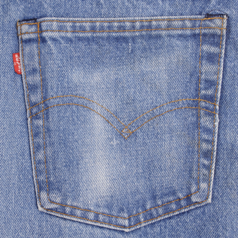 Beautiful Indigo Levis 517 Jeans With Blue Bar Tacks 1980s Made in USA with Medium Dark Wash With Light Whiskers.   Size on tag 34X34 Actual Size 33X34 Back Button #650