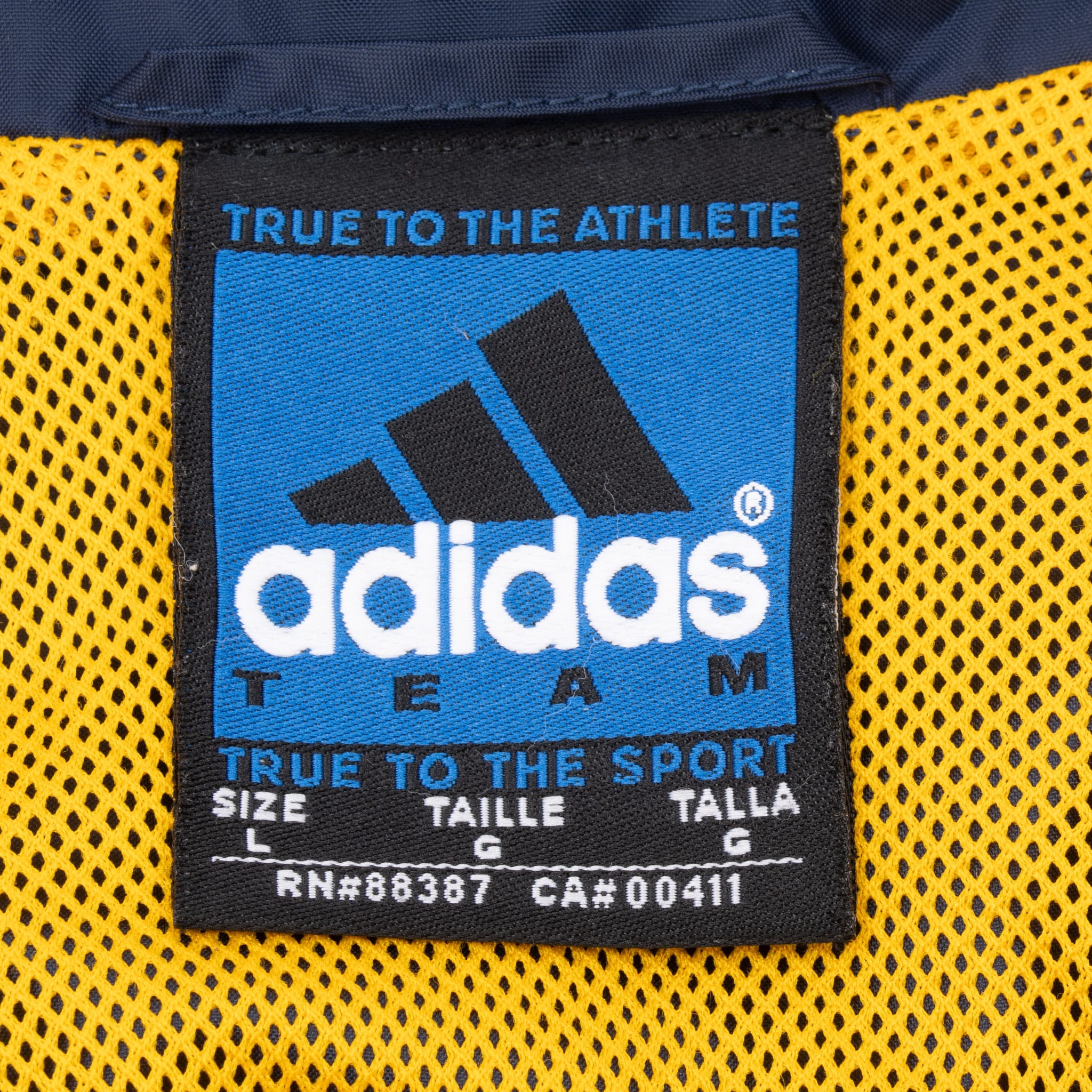 VINTAGE ADIDAS NCAA UCLA BLUE WINDBREAKER JACKET 1990S LARGE