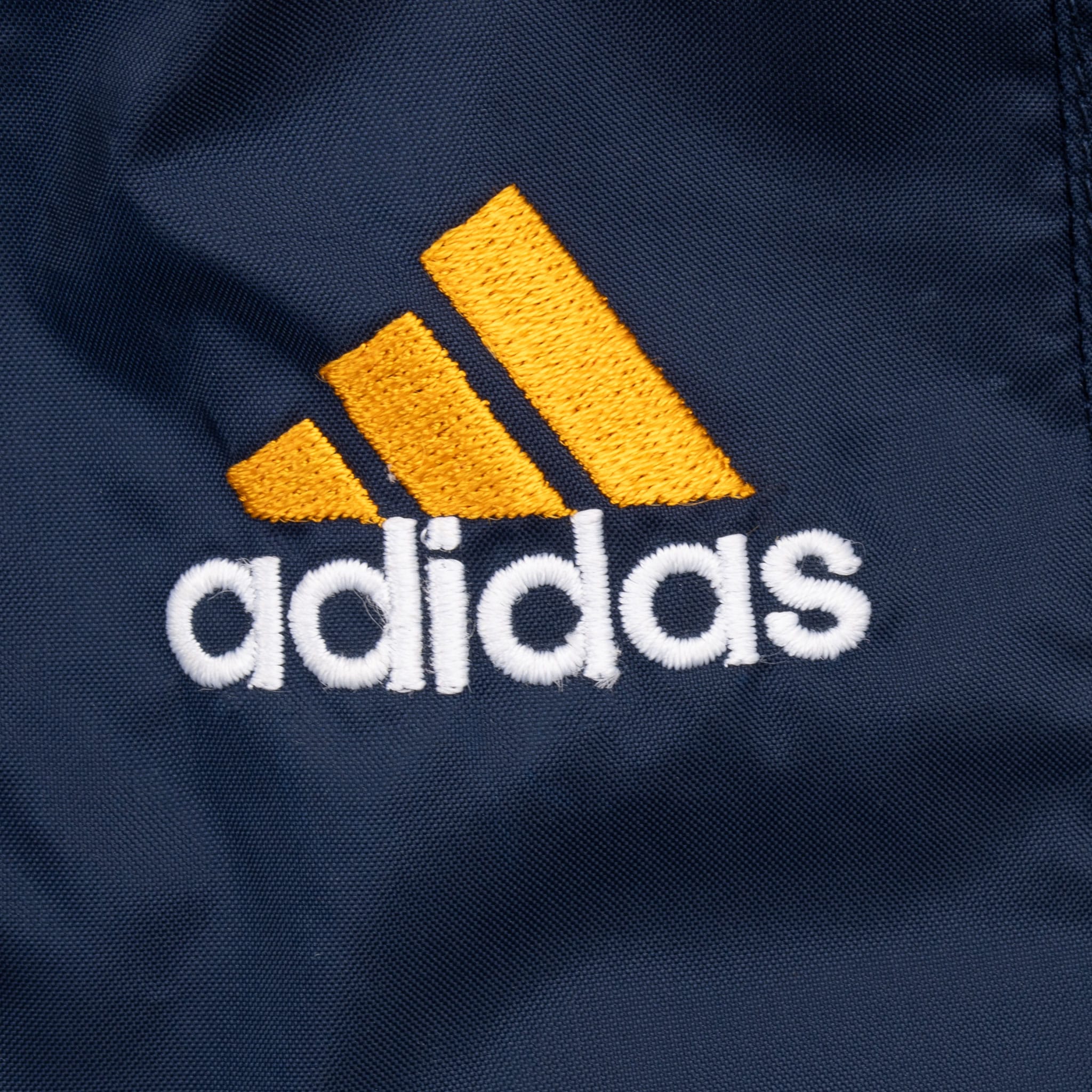VINTAGE ADIDAS NCAA UCLA BLUE WINDBREAKER JACKET 1990S LARGE
