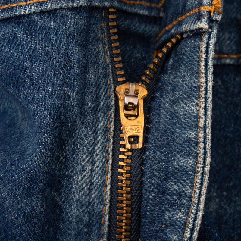 Beautiful Vintage Indigo Levis 505 Orange Tab Jeans Made in USA with Medium Wash and some Light Whiskers

Size on Tag 40X33 Actual Size 38X32

Back Button #554 talon Zipper