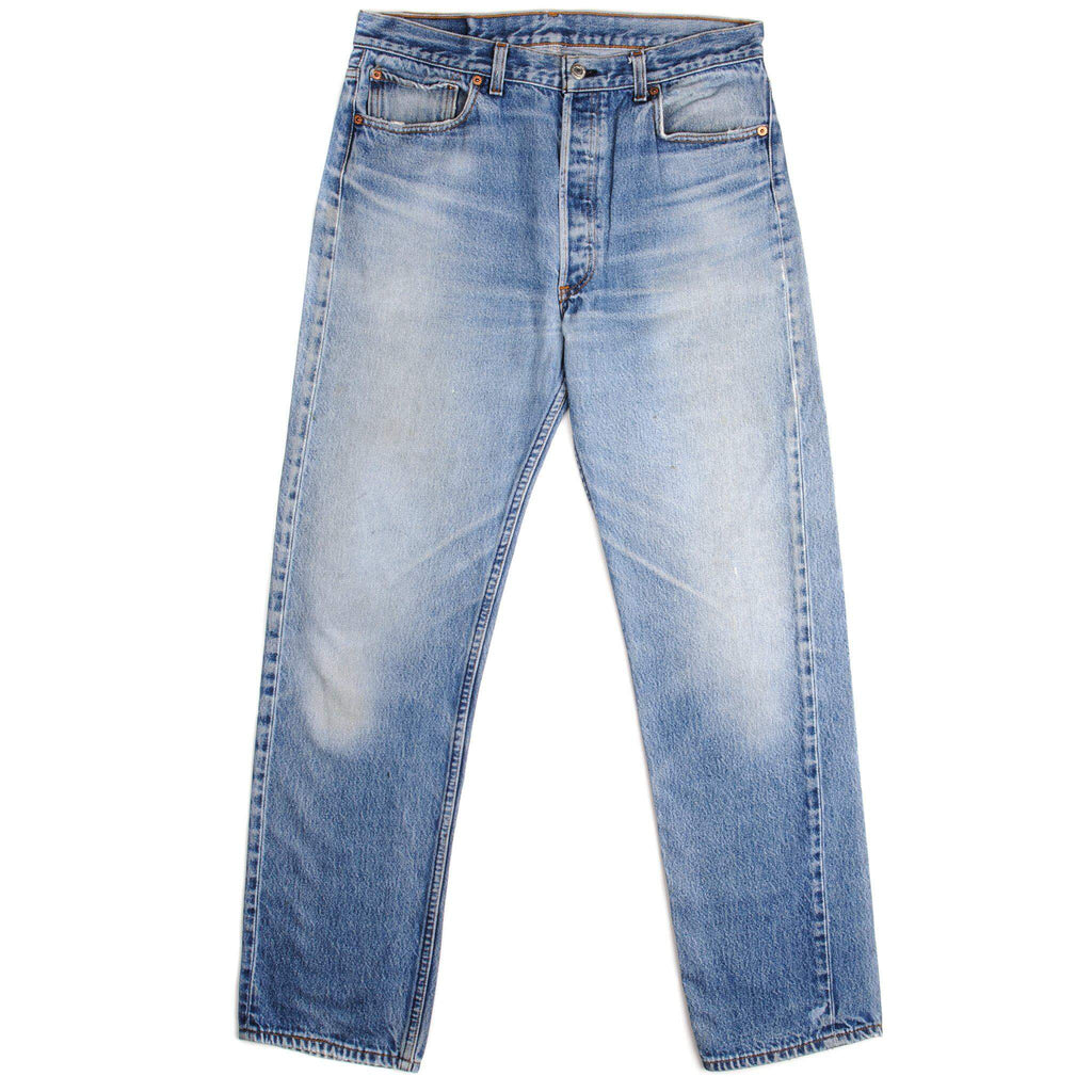 Beautiful Indigo Levis 501 Jeans Made in USA with a light blue wash, some nice whiskers and a nice contrast of light and medium blue.  Size 32x31  Back Button #5
