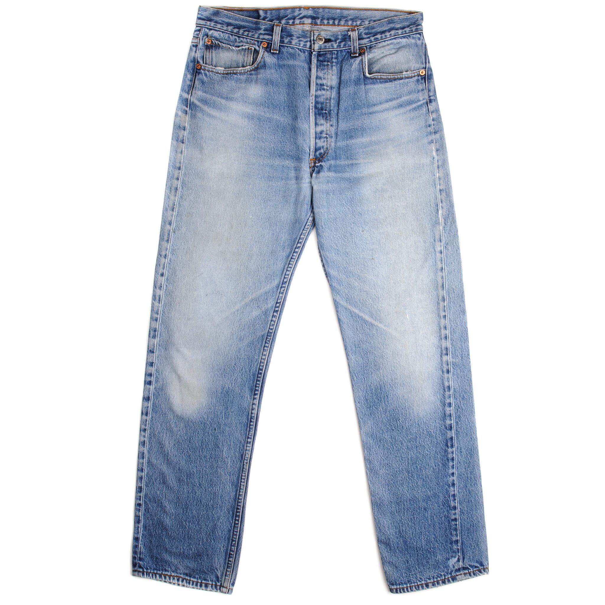 Beautiful Indigo Levis 501 Jeans Made in USA with a light blue wash, some nice whiskers and a nice contrast of light and medium blue.  Size 32x31  Back Button #5