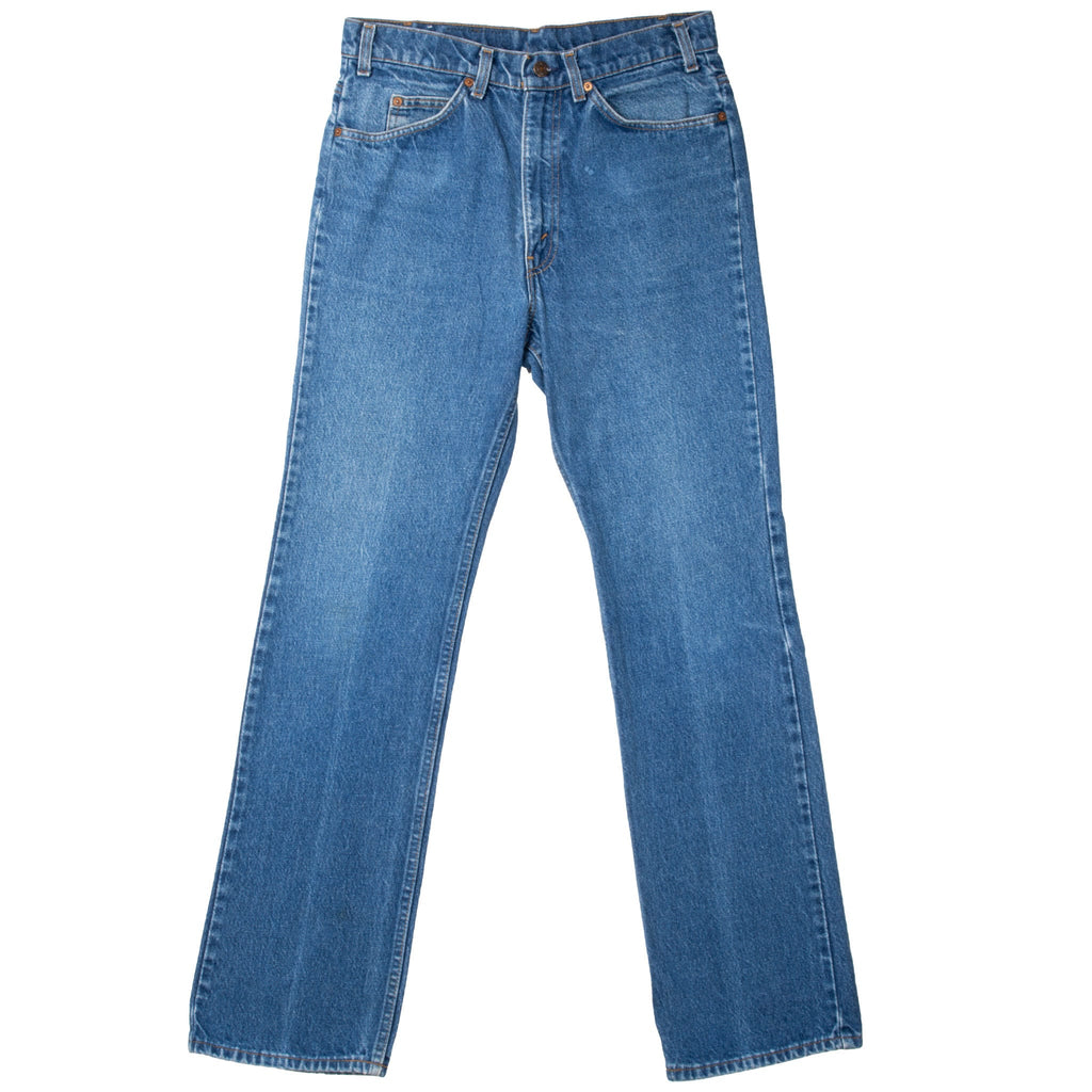 Front view of Levi's 517 medium indigo blue jeans with five-pocket styling and contrast stitching