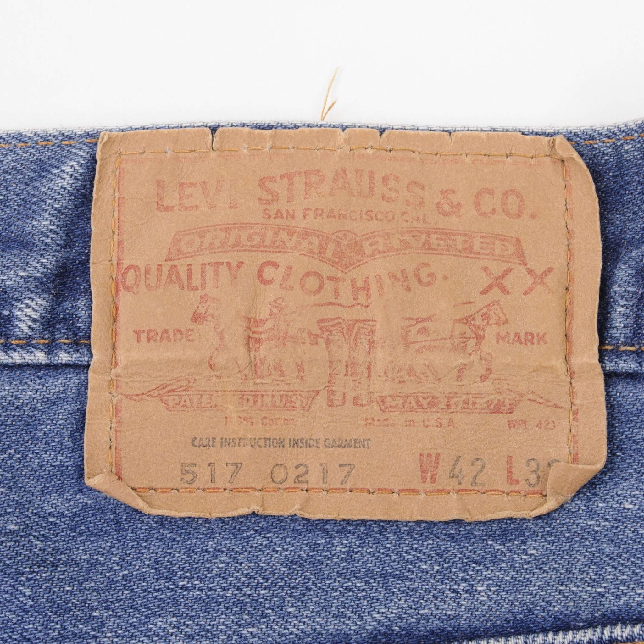 Beautiful Indigo Levis 517 1980s Jeans With Single Stitch Made in USA with Medium Blue Wash  Size 42x31 Back button #2  Zip: Talon