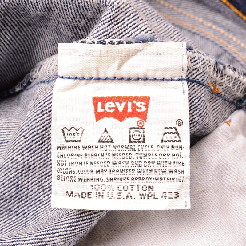 Beautiful Indigo Levis 501 Jeans Made in USA with a very dark wash.  Size on Tag 34X32  ACTUAL SIZE 34X30  Back Button #524