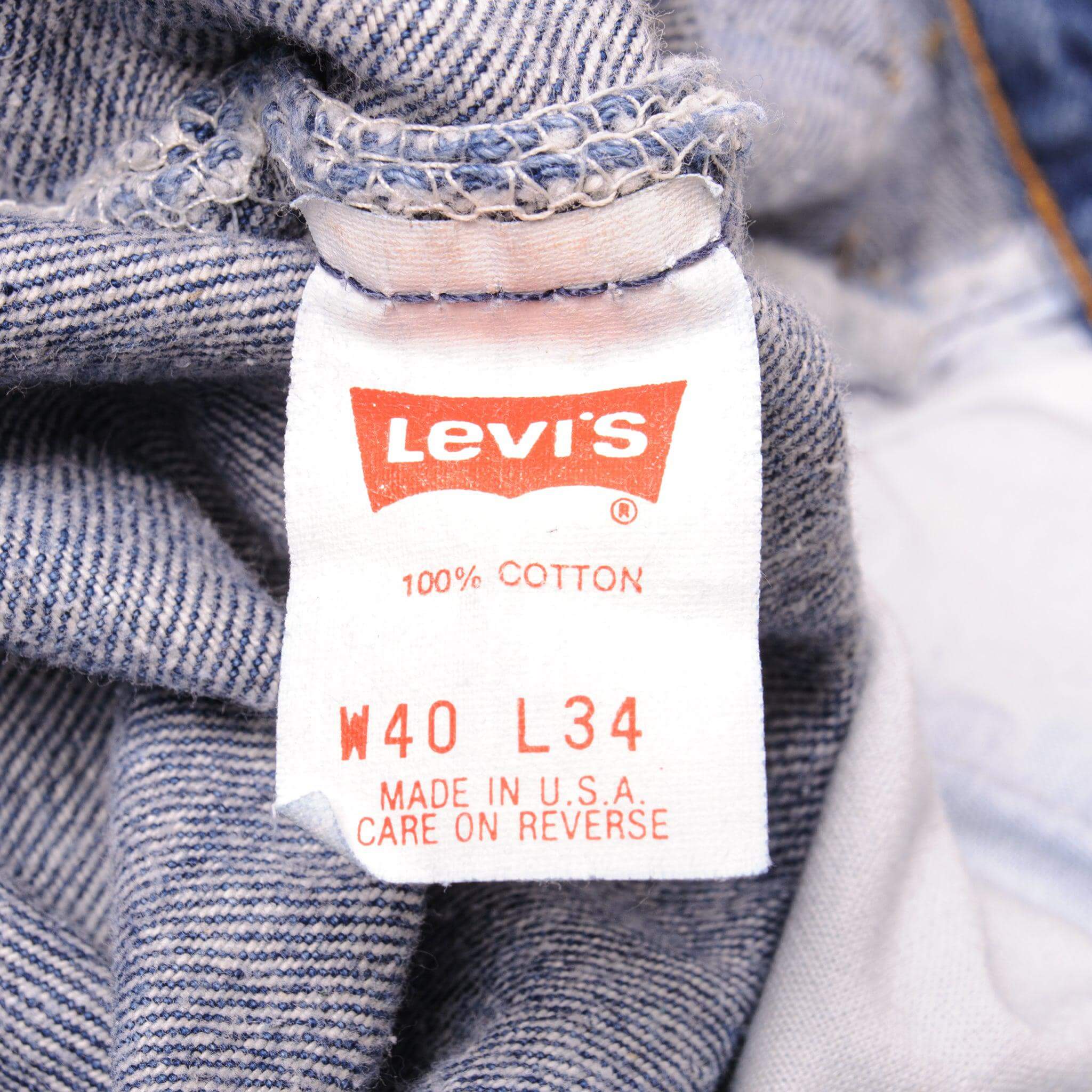 Beautiful Indigo Levis 501 Jeans Made in USA with a medium blue wash, some nice contrast between light and medium blue and some very light whiskers.  Size on Tag 40X34  ACTUAL SIZE 38X32  Back Button #511