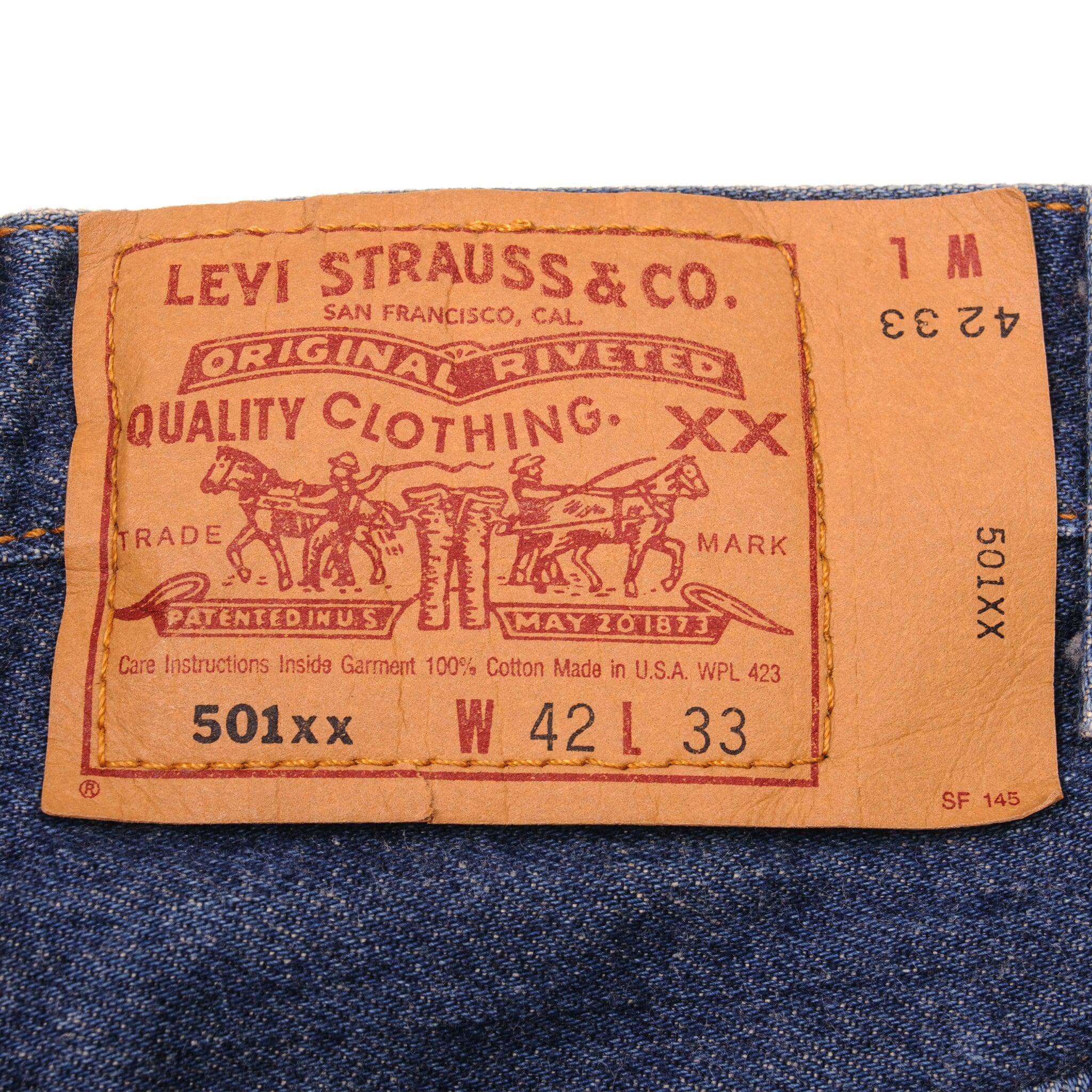 Beautiful Indigo Levis 501 Jeans 1990's Made in USA with a dark blue wash, some nice contrast between light and dark blue.  Size on Tag 42X33  ACTUAL SIZE 41X29  Back Button #552