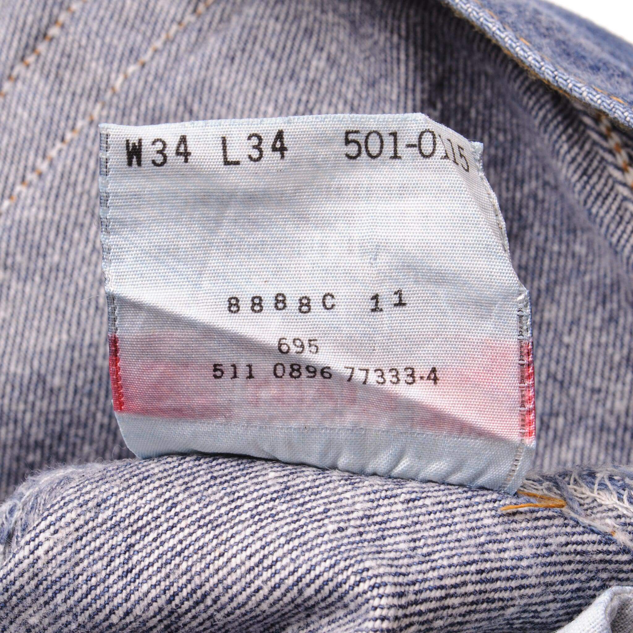 Beautiful Indigo Levis 501 Jeans 1990's Made in USA with a very dark wash.  Size on Tag 34X34  ACTUAL SIZE 33X33  Back Button #511