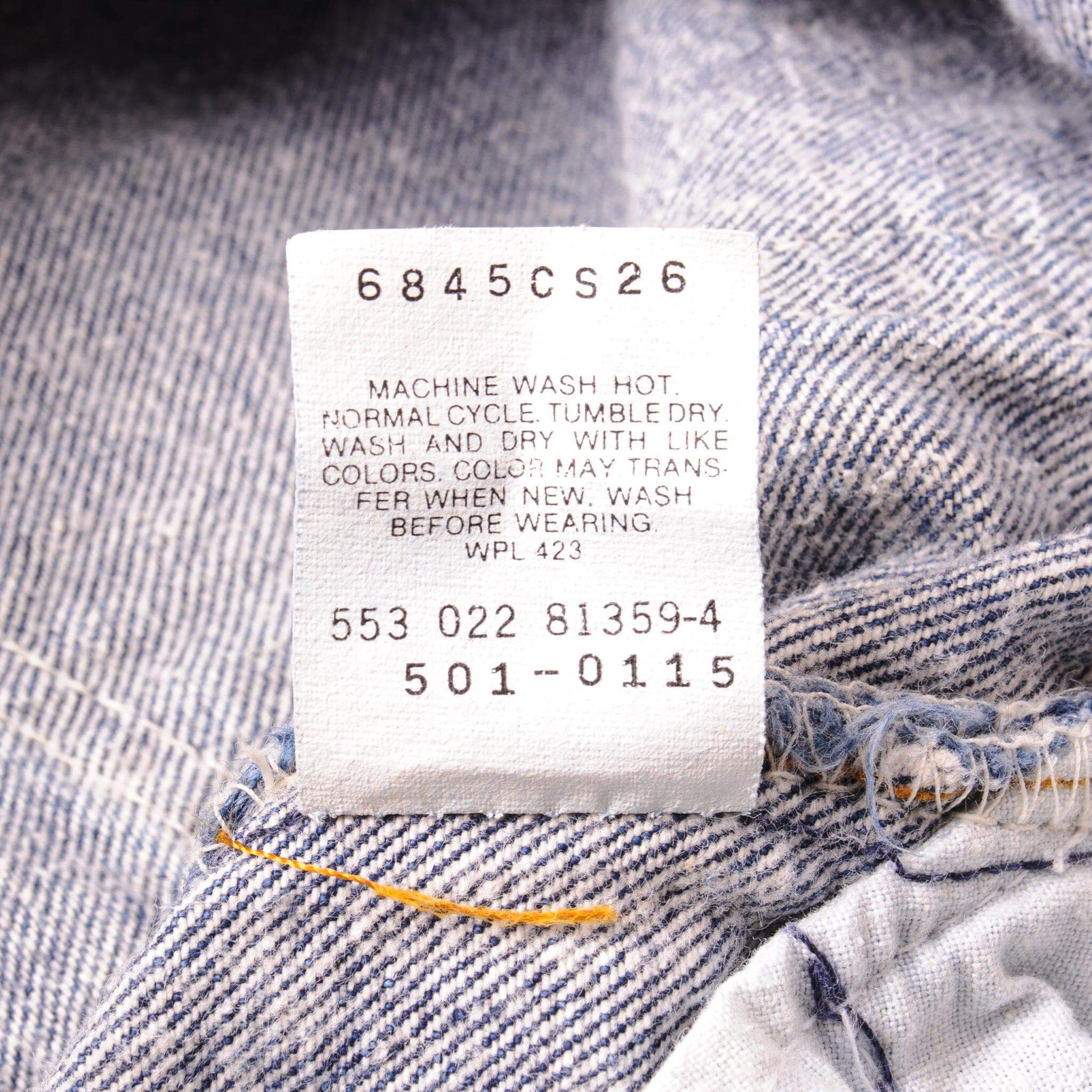 Beautiful Indigo Levis 501 Jeans 1990's Made in USA with a dark wash.  Size on Tag 35X30  ACTUAL SIZE 33X29  Back Button #553