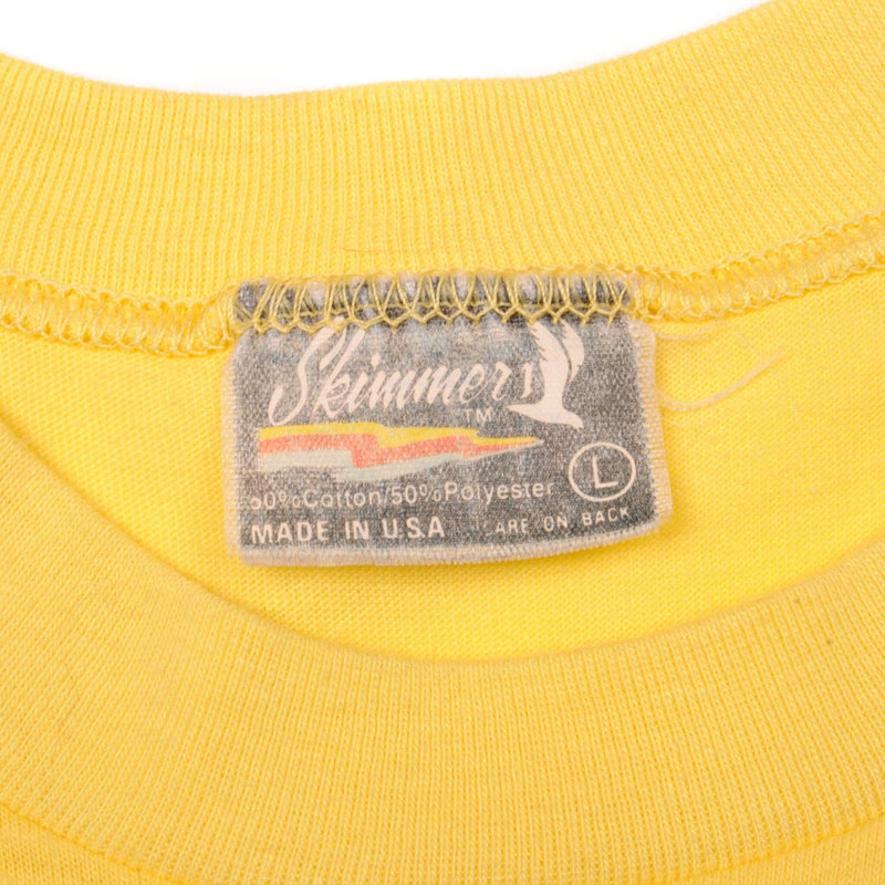 Vintage American Motorcyclist Association World Champions Motocross & Trophee Des Nations Skimmer Tee Shirt 1984 Size Medium Made In USA with single stitch sleeves.