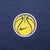 Close-up of yellow basketball and Nike Swoosh chest graphic on navy fabric
