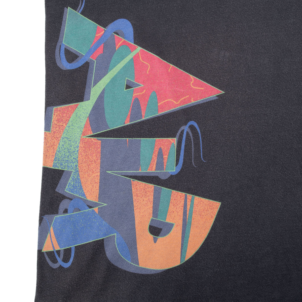 Close-up of multicolor abstract Nike Air graphic on black fabric