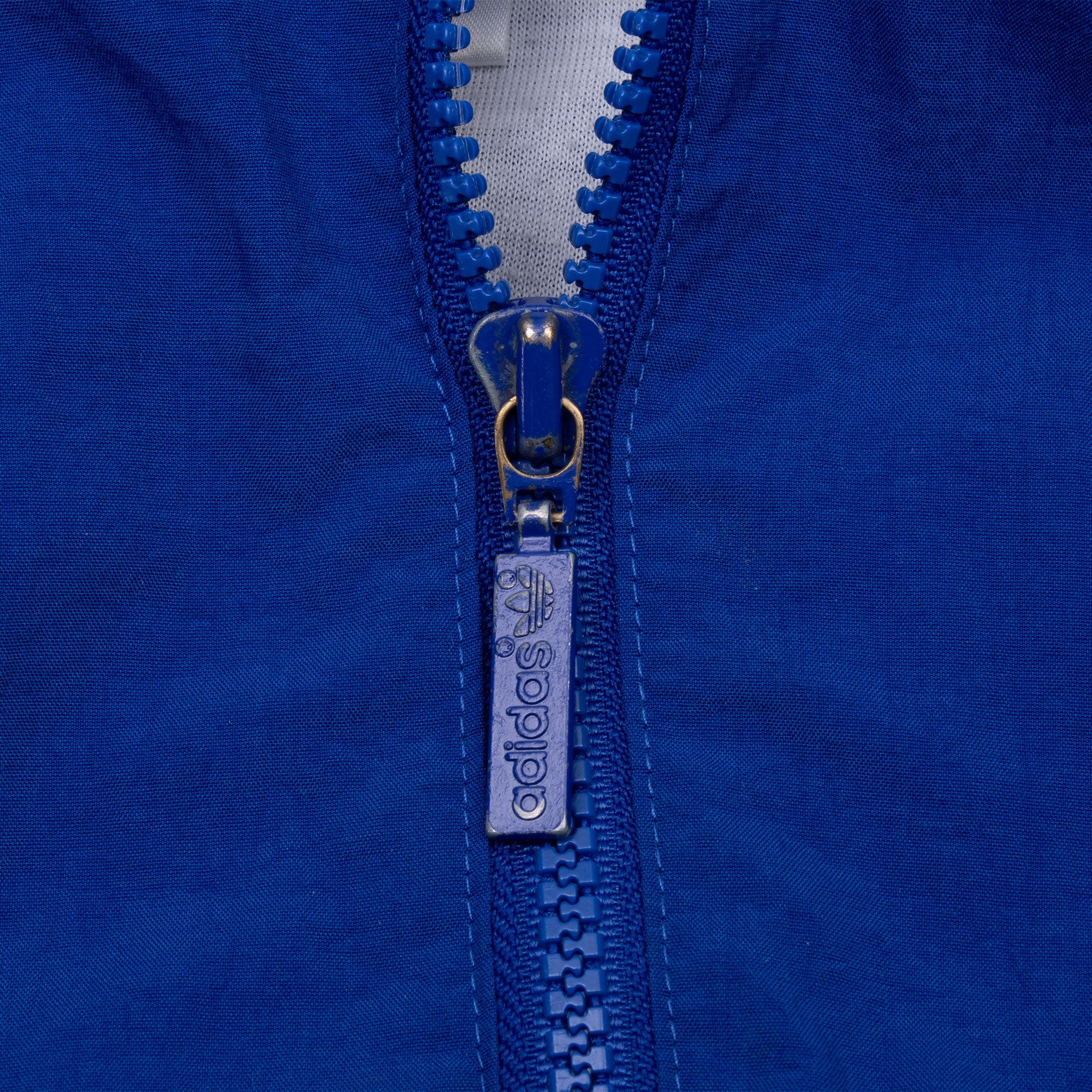 VINTAGE ADIDAS TEAM PURPLE BLUE WINDBREAKER JACKET 1980S MEDIUM