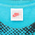Nike medium Made in U.S.A. neck tag on turquoise Andre Agassi T-shirt