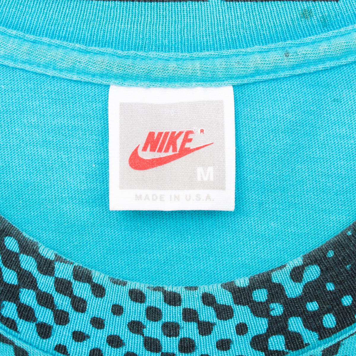 Nike medium Made in U.S.A. neck tag on turquoise Andre Agassi T-shirt