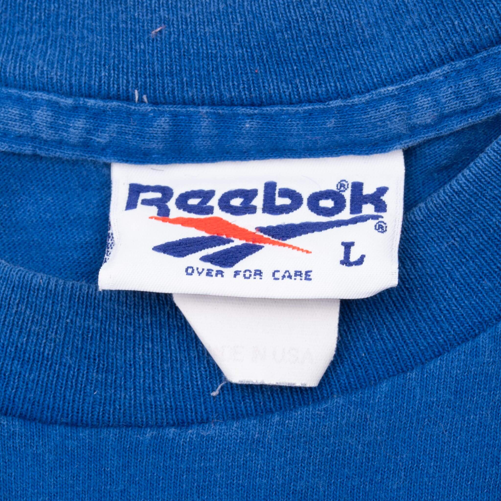 Vintage Reebok 1990S Blue Tee Shirt Size Large Made In USA With Single Stitch Sleeves