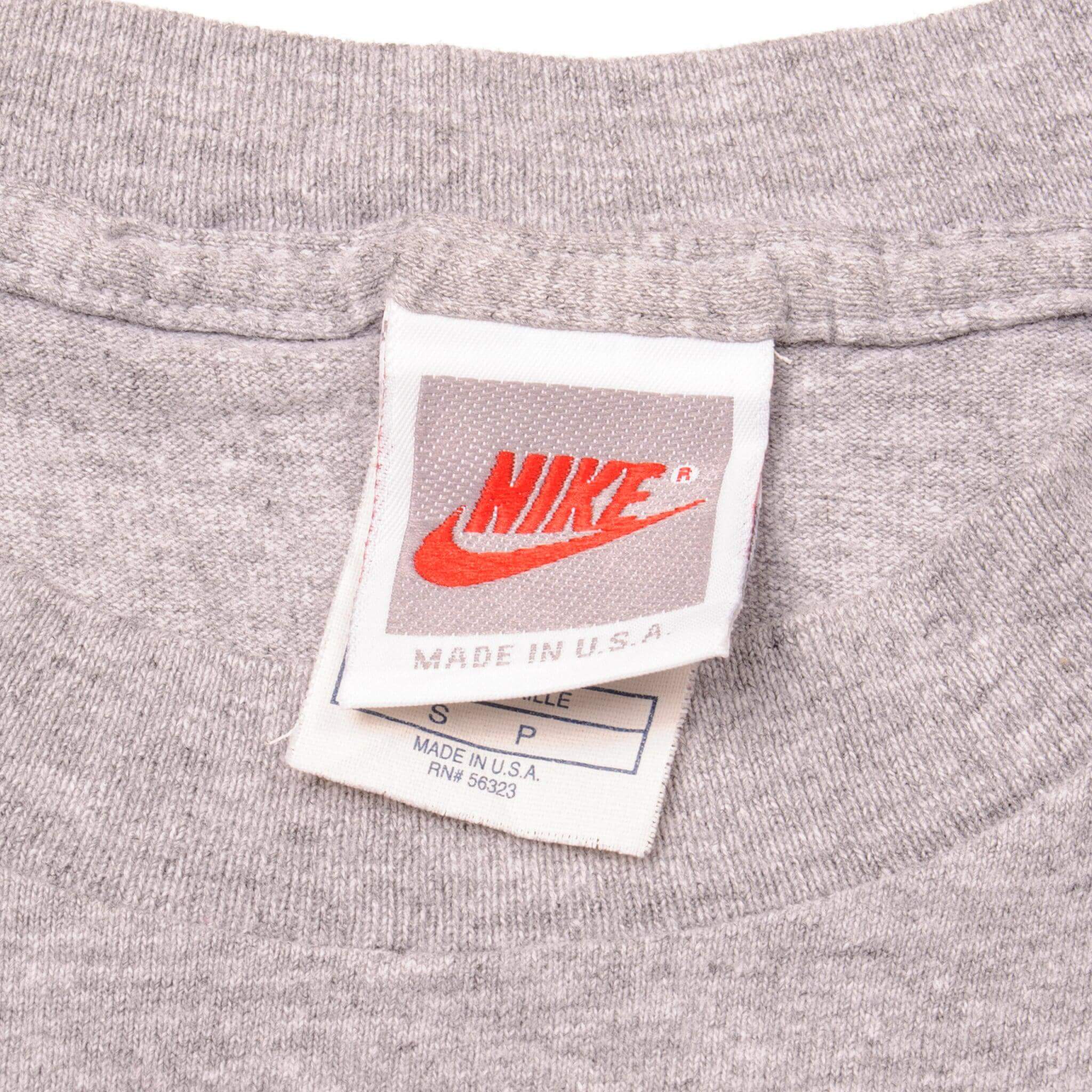 Vintage Nike Big Swoosh Logo Tee Shirt 1987-1994 Size S Made In USA with single stitch sleeves.