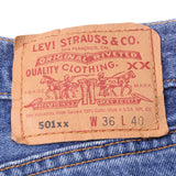 Beautiful Indigo Levis 501 Jeans 1990S Made in USA with Medium wash Size on Tag 36X40 Actual Size 34X37 Back Button #653