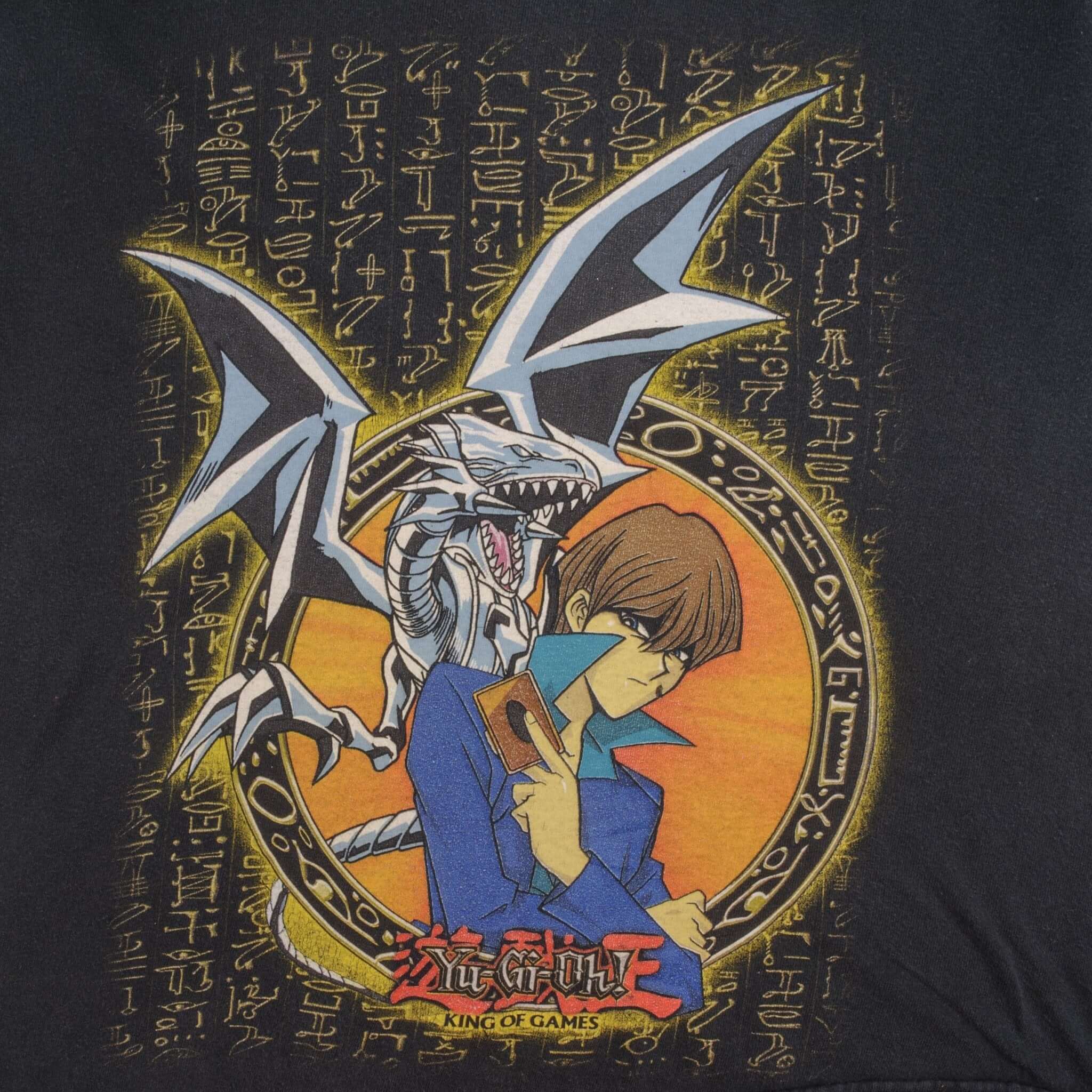 Close-up of Seto Kaiba and Blue-Eyes White Dragon front graphic on black Yu-Gi-Oh tee