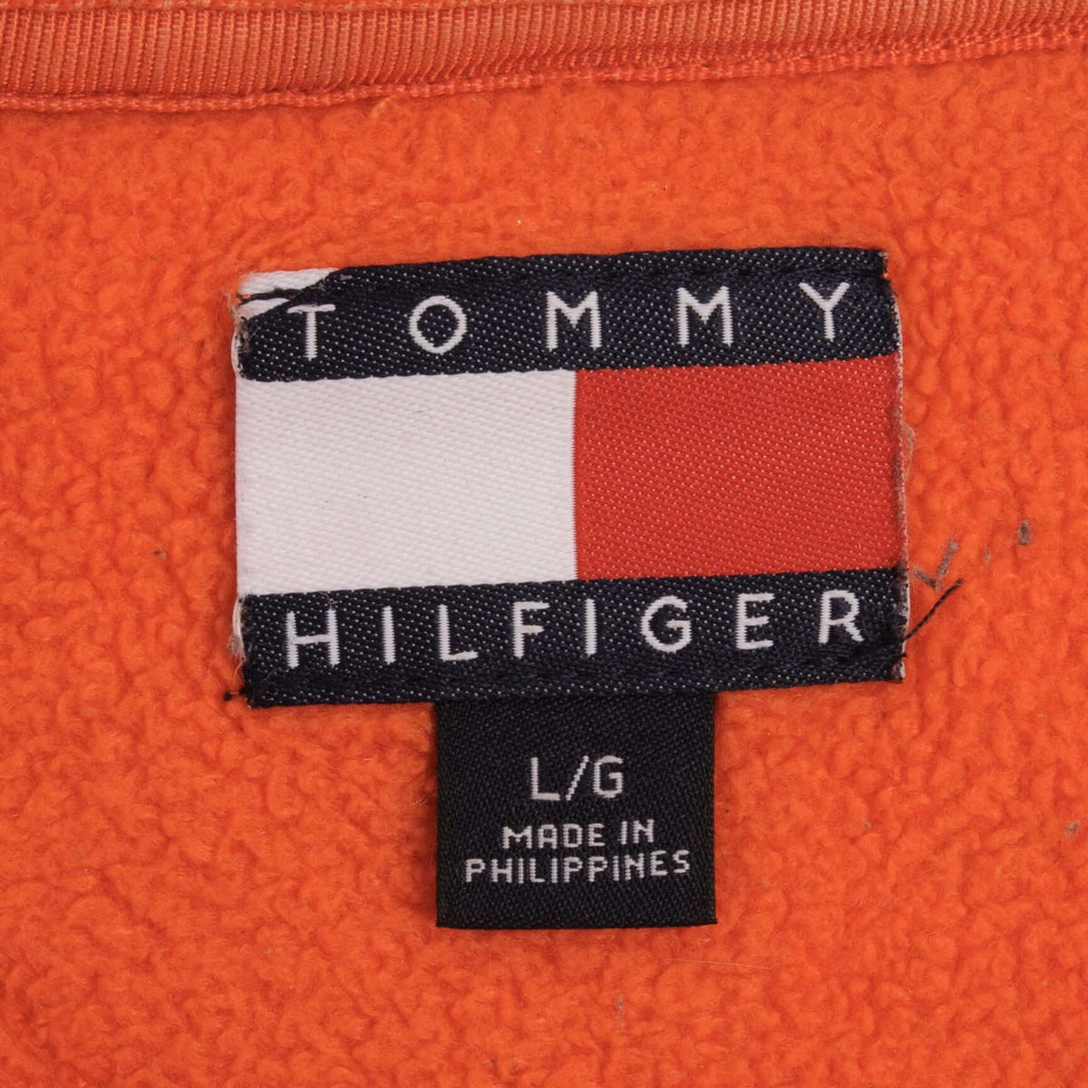 Tommy Hilfiger neck label marked L/G on orange fleece