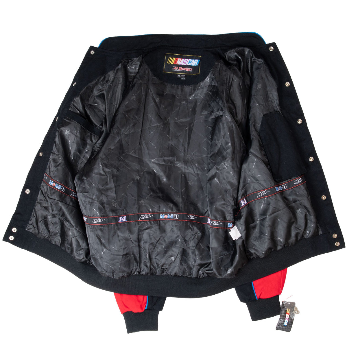 Open Tony Stewart NASCAR jacket showing black patterned lining and interior logo trim