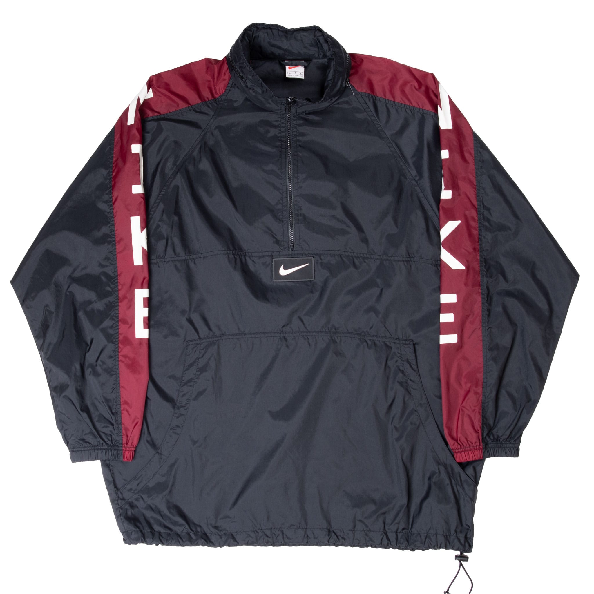 Full front of black Nike quarter-zip windbreaker with burgundy panels, pouch pocket and hem toggle