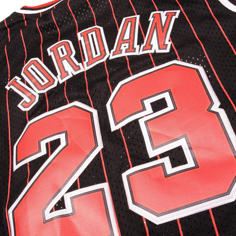 Vintage Champion NBA Chicago Bulls embroidered Michael Jordan number 23, from the 1990s Size XXL Made In Korea.