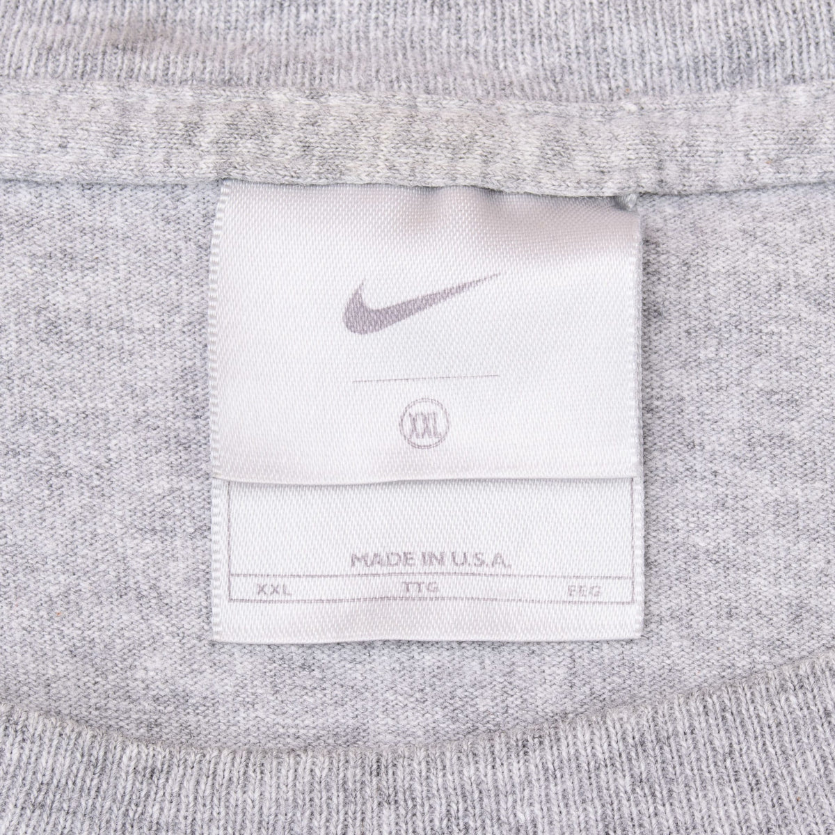 Nike neck tag showing size 2XL and Made in U.S.A.