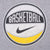 Close-up of circular Basketball graphic with Nike Swoosh and yellow accent