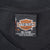 Harley-Davidson neck tag showing XL, pre-shrunk cotton and made in USA