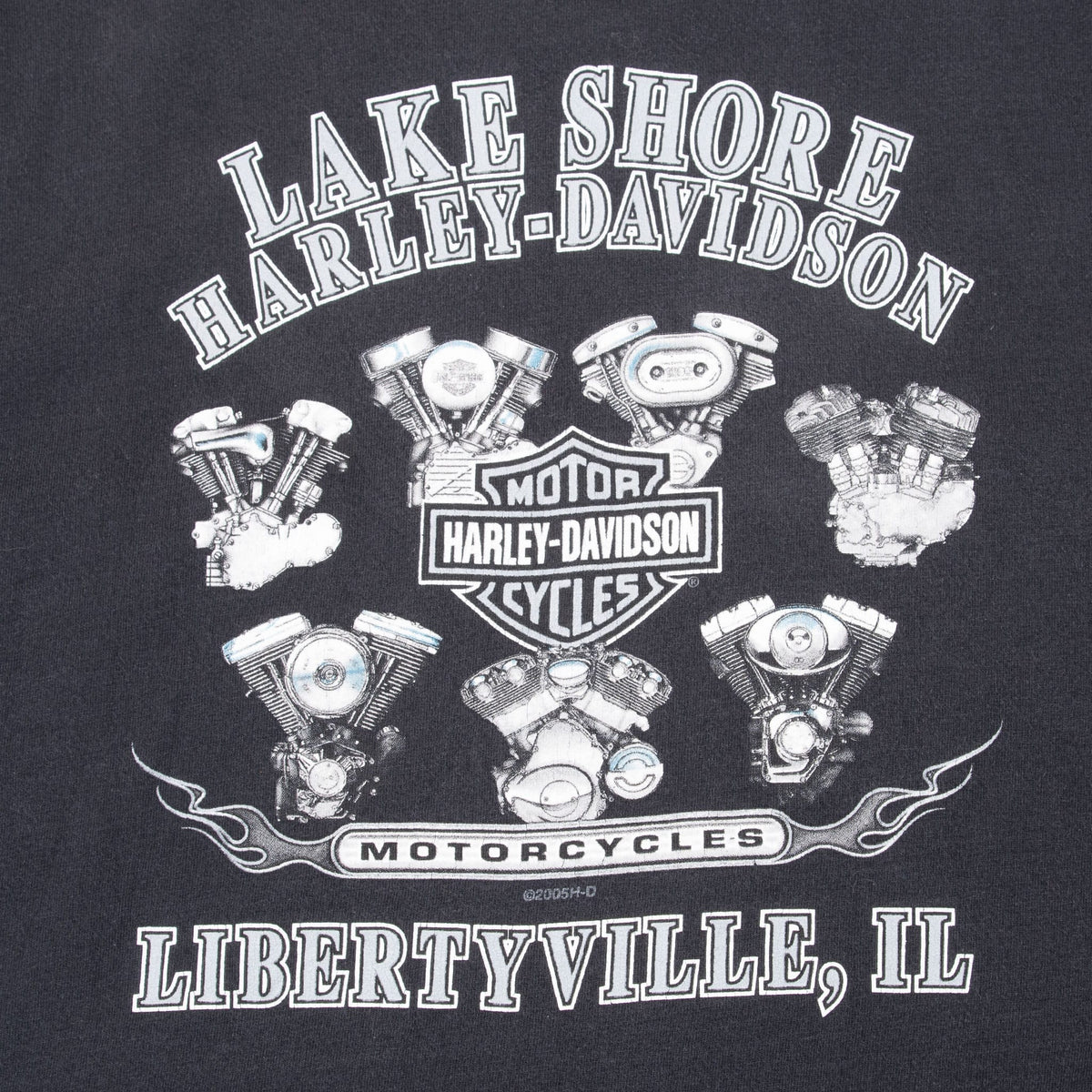 Close-up of Lake Shore Harley-Davidson back print with motorcycle engines and Libertyville, IL text