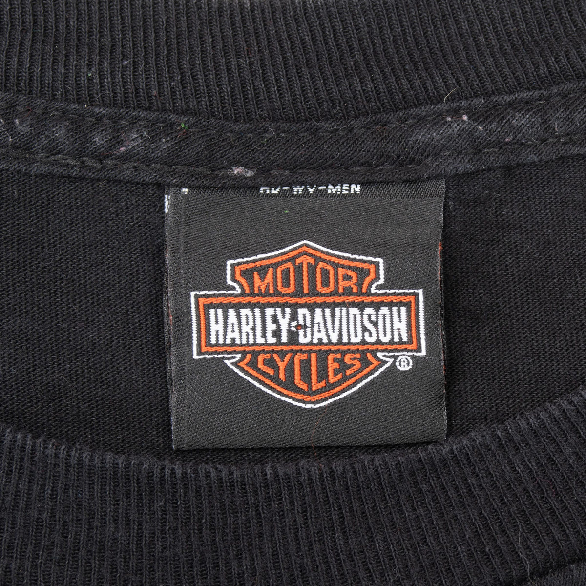 Harley-Davidson Motor Cycles neck tag on black T-shirt